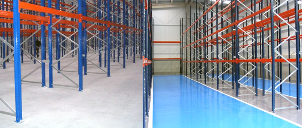 Reparación y pintado del pavimento en nave industrial con resina poliuretano en Pamplona (Navarra)